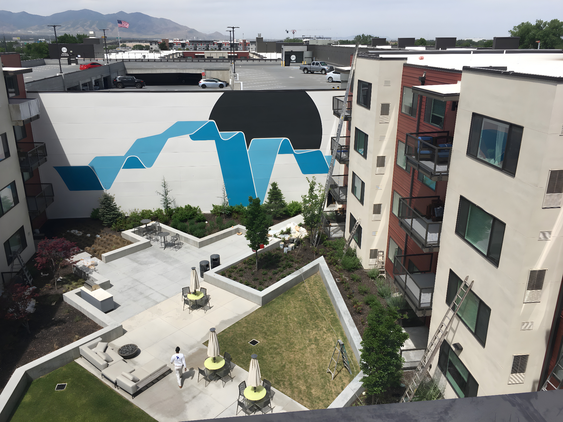 Color Drop repaint of a multi-family apartment building exterior with fresh two-tone color scheme